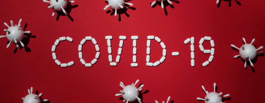 Covid-19 Corona Virus Pandemic Diseases On Red Background 