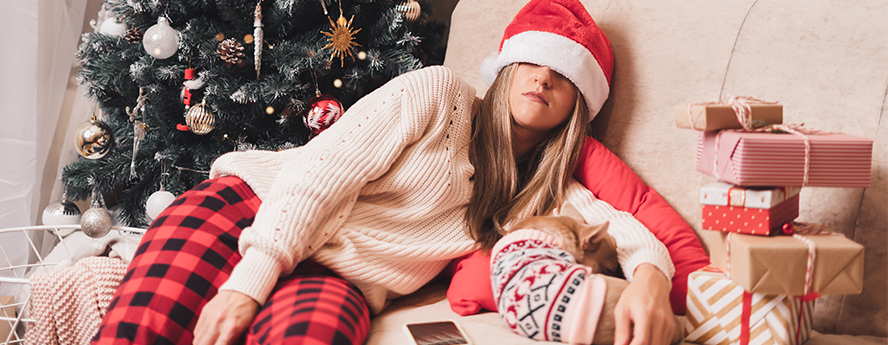 Woman stressed at Christmas with dog